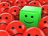 Зеленый смайл улыбается среди грустных красных