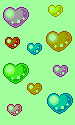 Разноцветные сердечки на зеленом