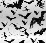 Halloween. Полет черных летучих мышей на белом